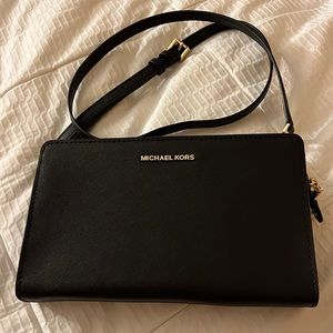 Jet Set Travel Leather Crossbody Clutch